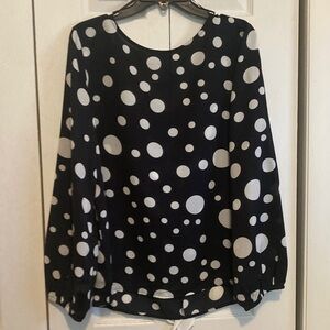 Poka Dotted top with Ruffle Bow Detail in the Back. NWT